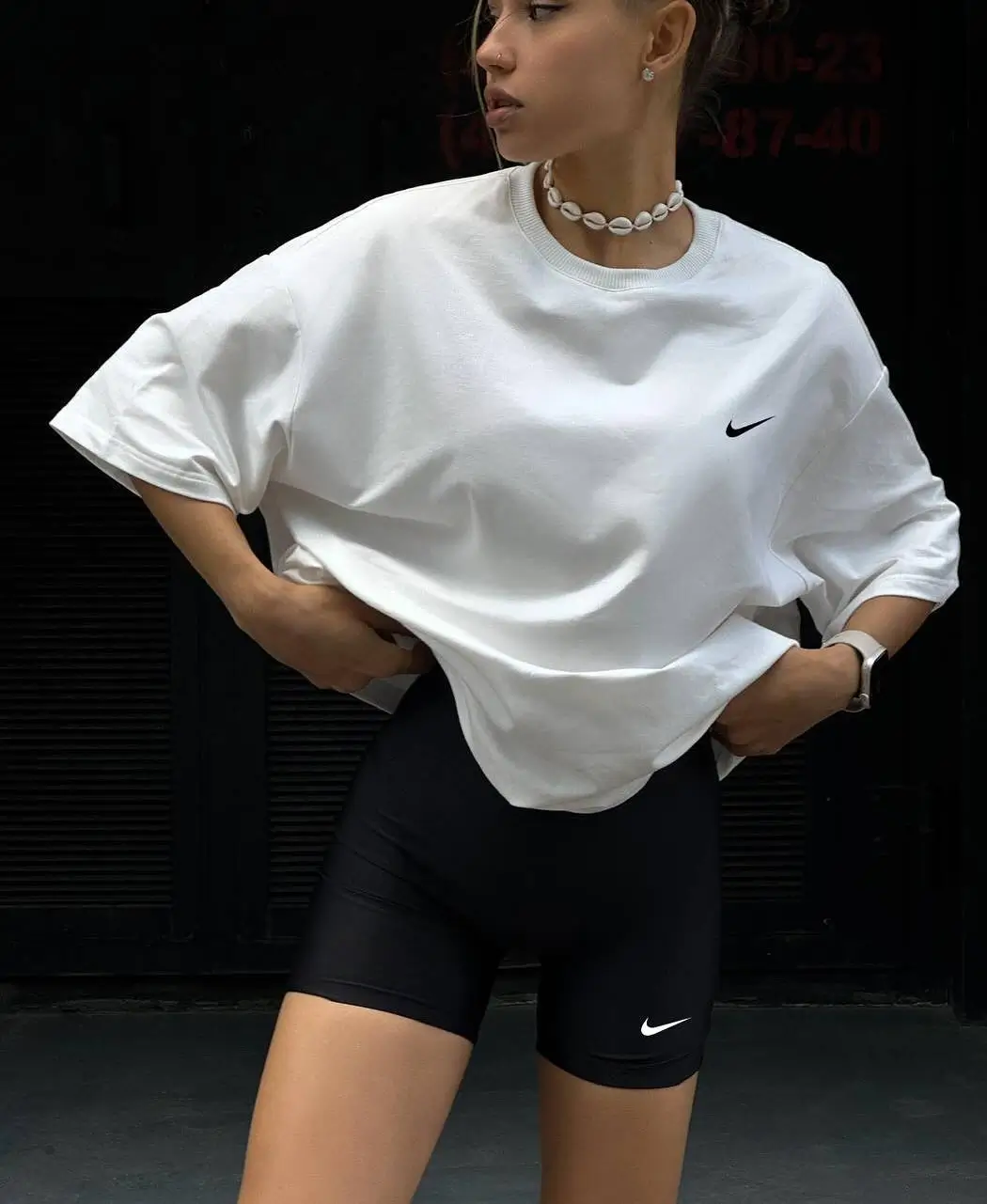 biker shorts outfits summer 2026 Crisp White Tee and Black Shorts with Sporty Edge