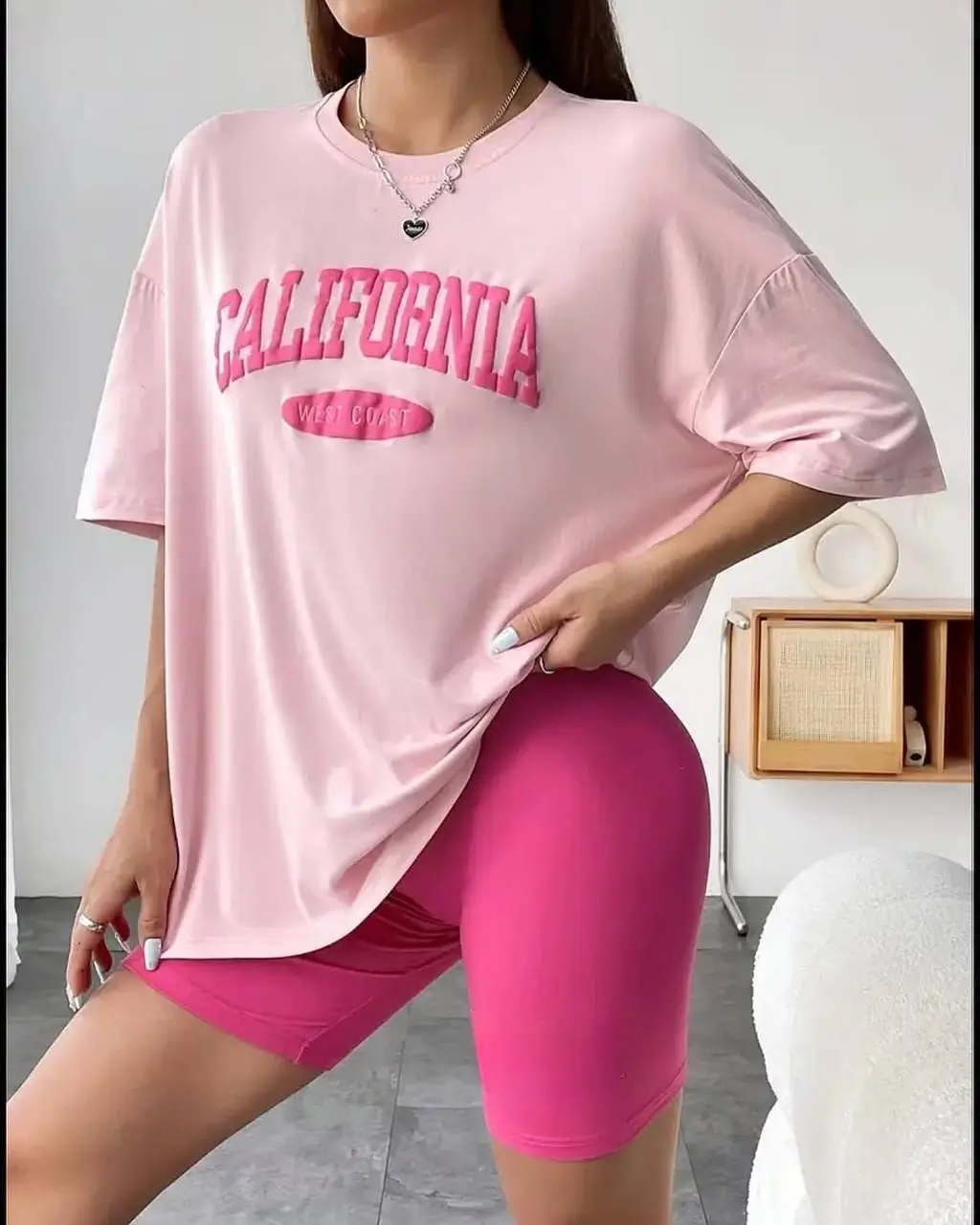biker shorts outfits summer 2026 Hot Pink Shorts with Oversized Tee for a Playful Mood