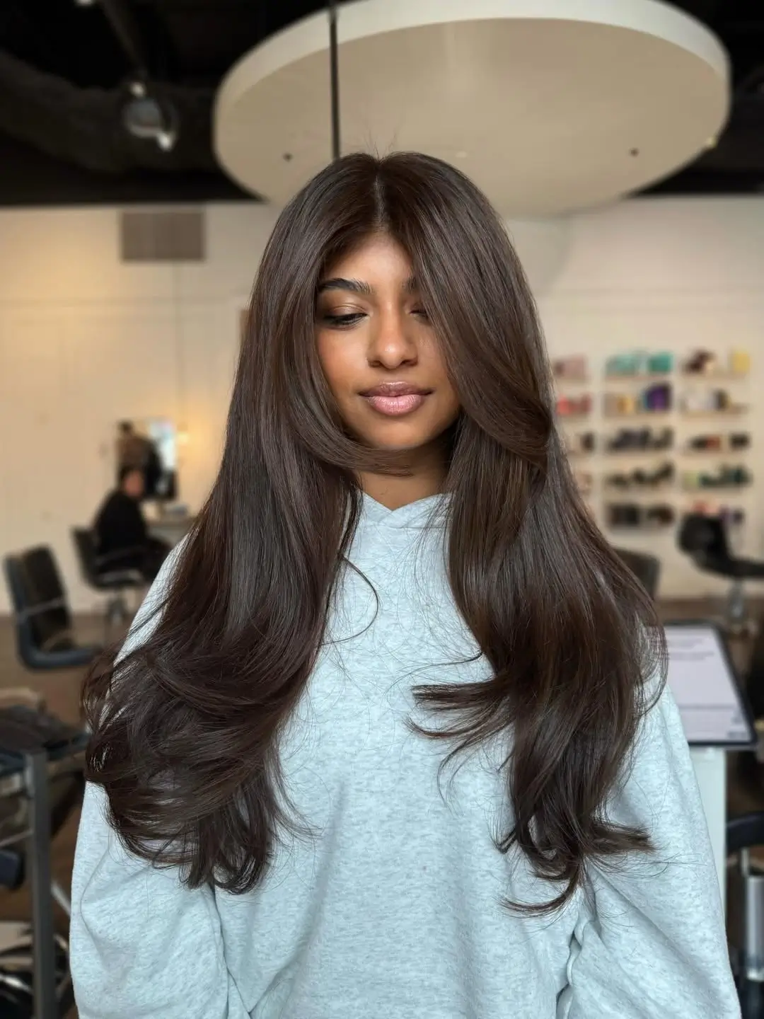 chic summer haircut 2026 Polished Mid Length Layers With a Parisian Touch