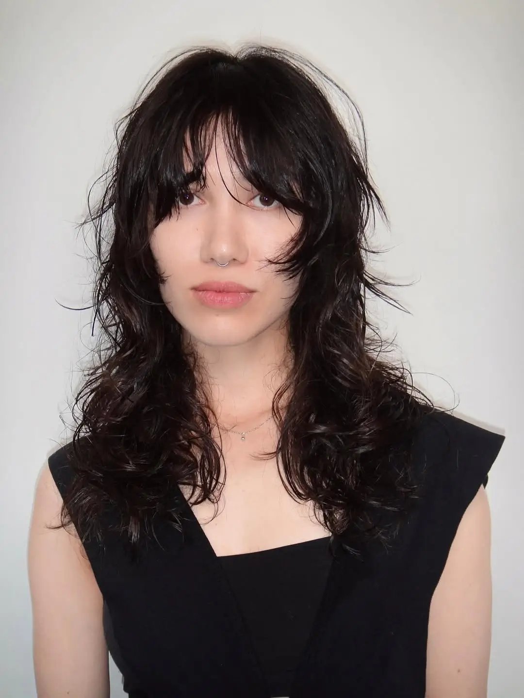 chic summer haircut 2026 Messy Shaggy Layers With Soft Fringe Energy