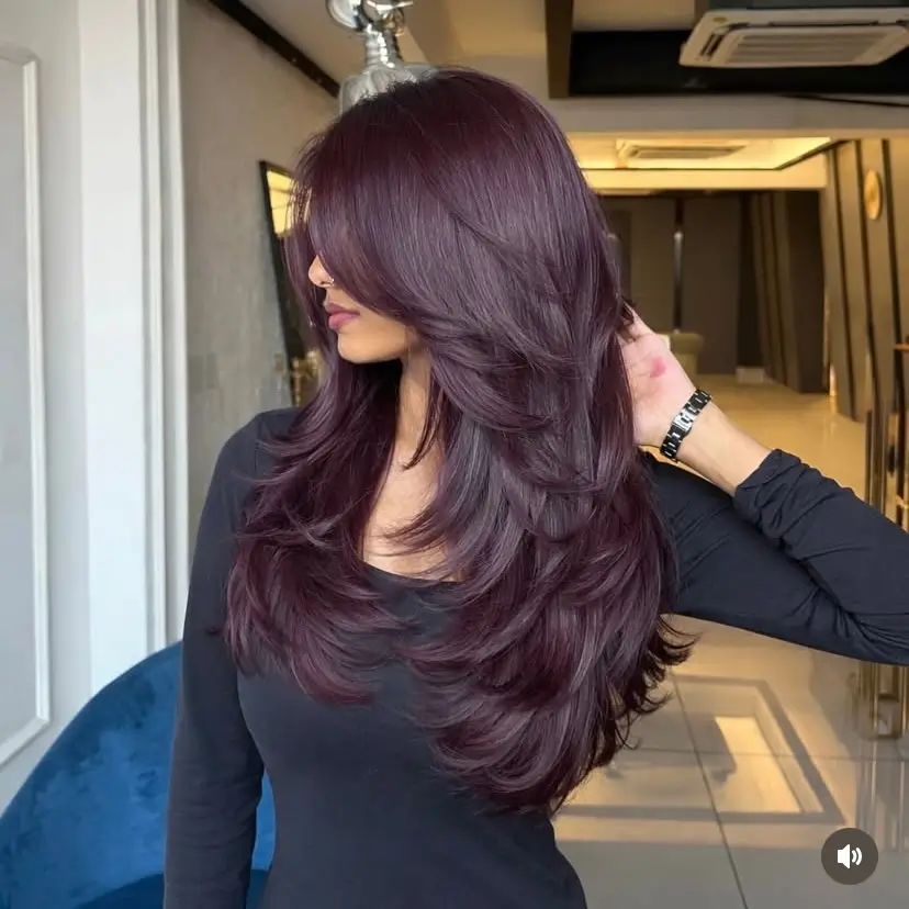 chic summer haircut 2026 Long layered volume with deep brunette shine