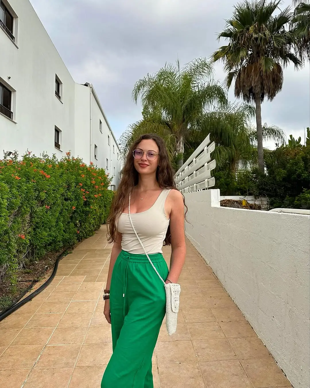 comfy airport outfits summer 2026 Green Pants and Tank That Feel Like Vacation Already