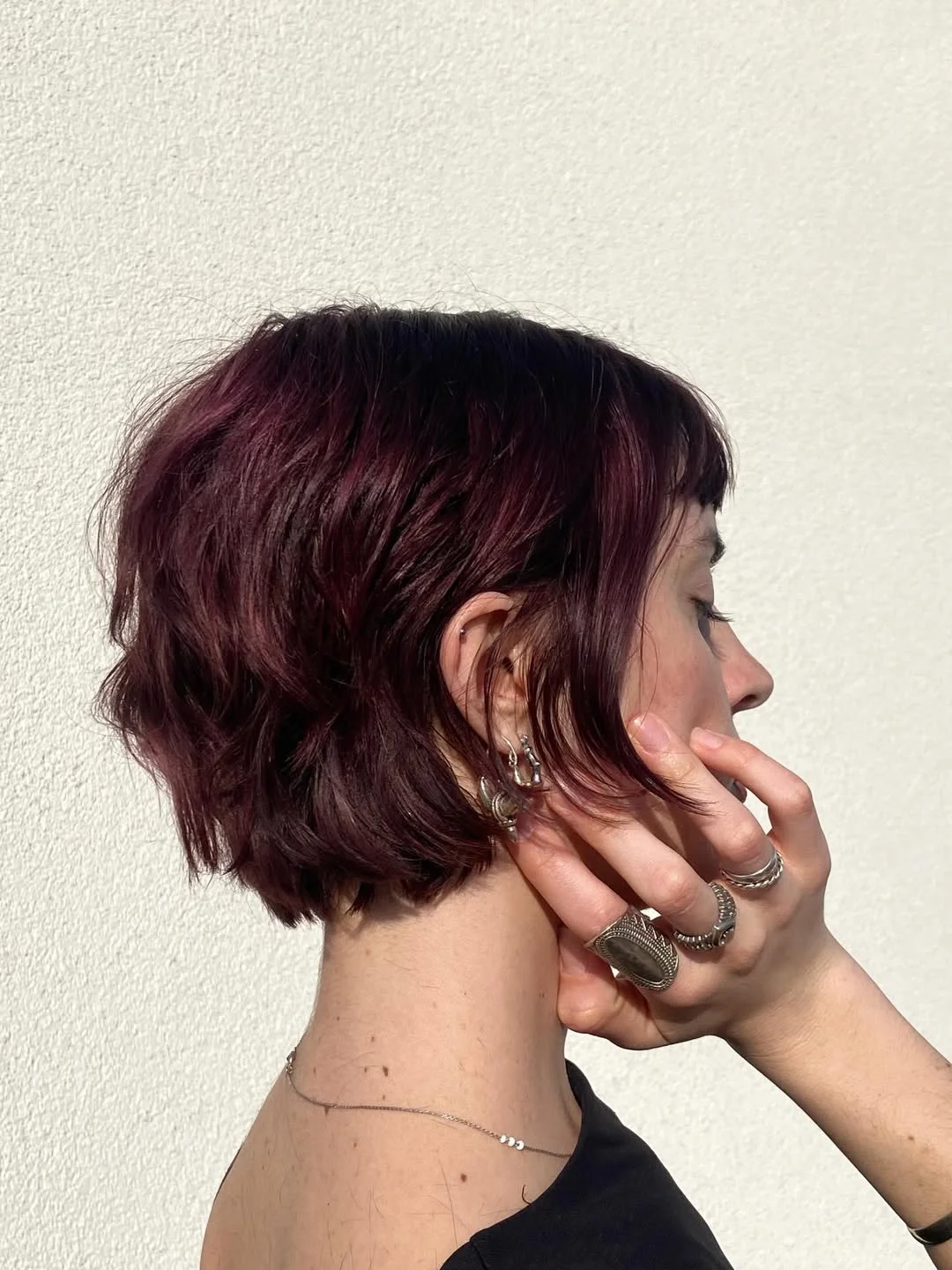 cute summer bixie haircut 2026 Deep Red Textured Bixie with a Slight Grunge Edge