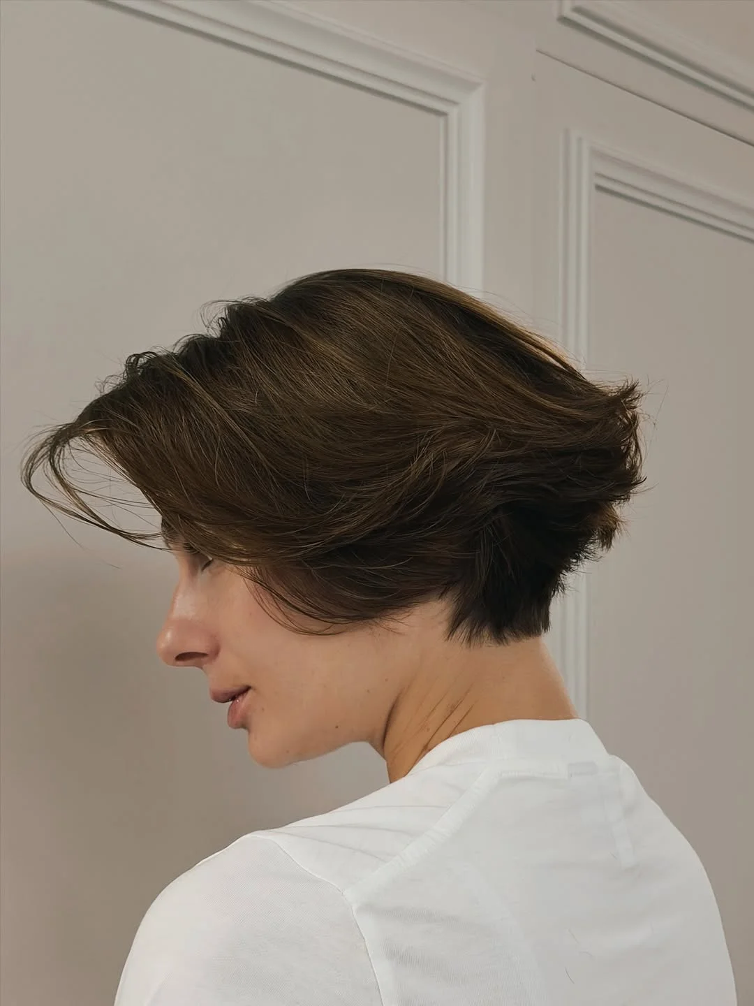 cute summer bixie haircut 2026 Layered Bixie with Longer Side Sweep
