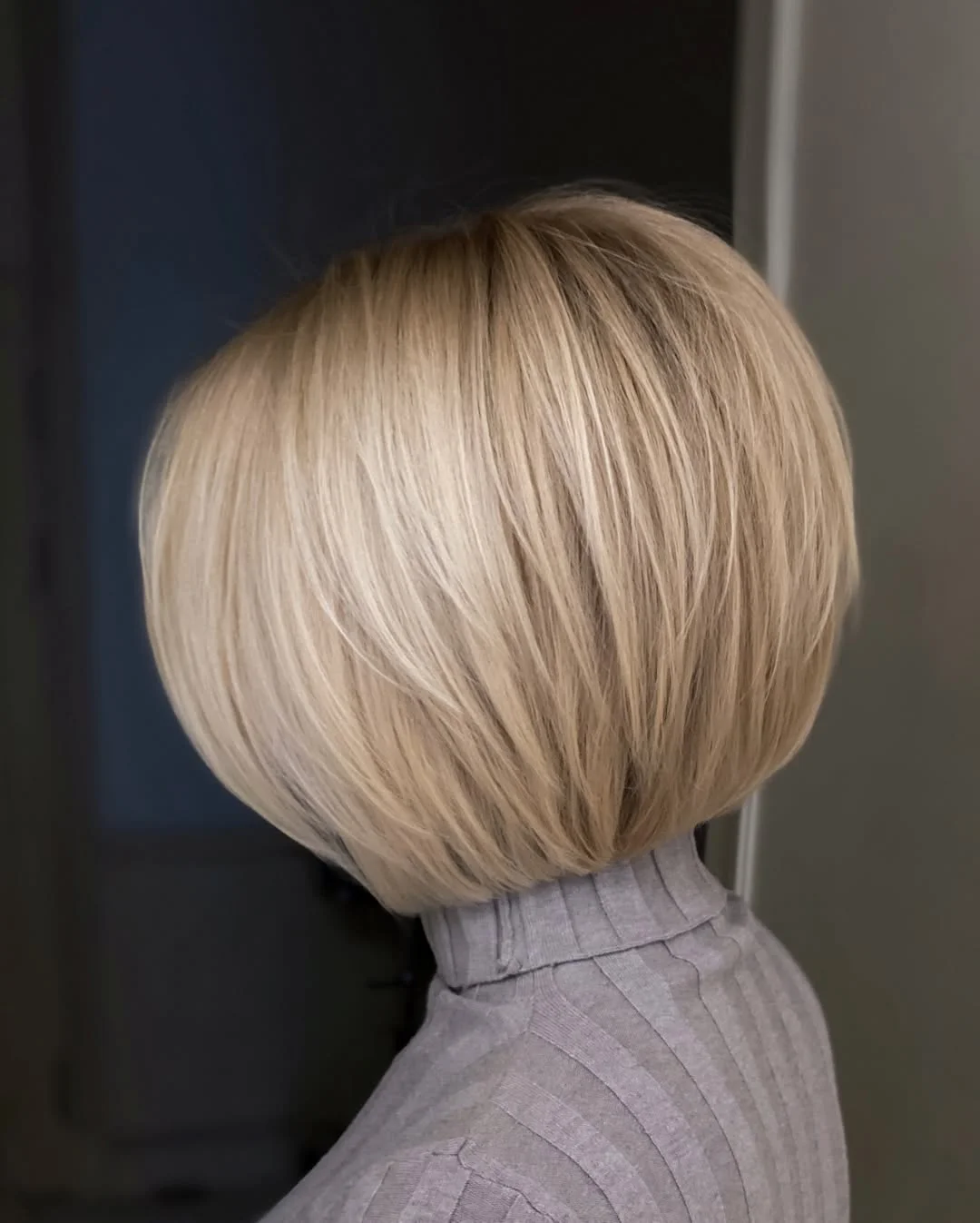 cute summer short haircuts 2026 Rounded Classic Bob with Polished Finish