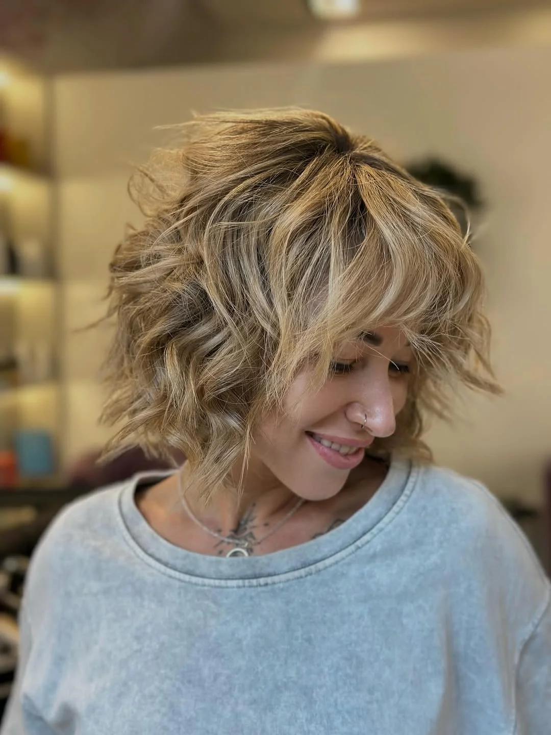 cute summer short haircuts 2026 Shaggy Wavy Bob with Curtain Bangs