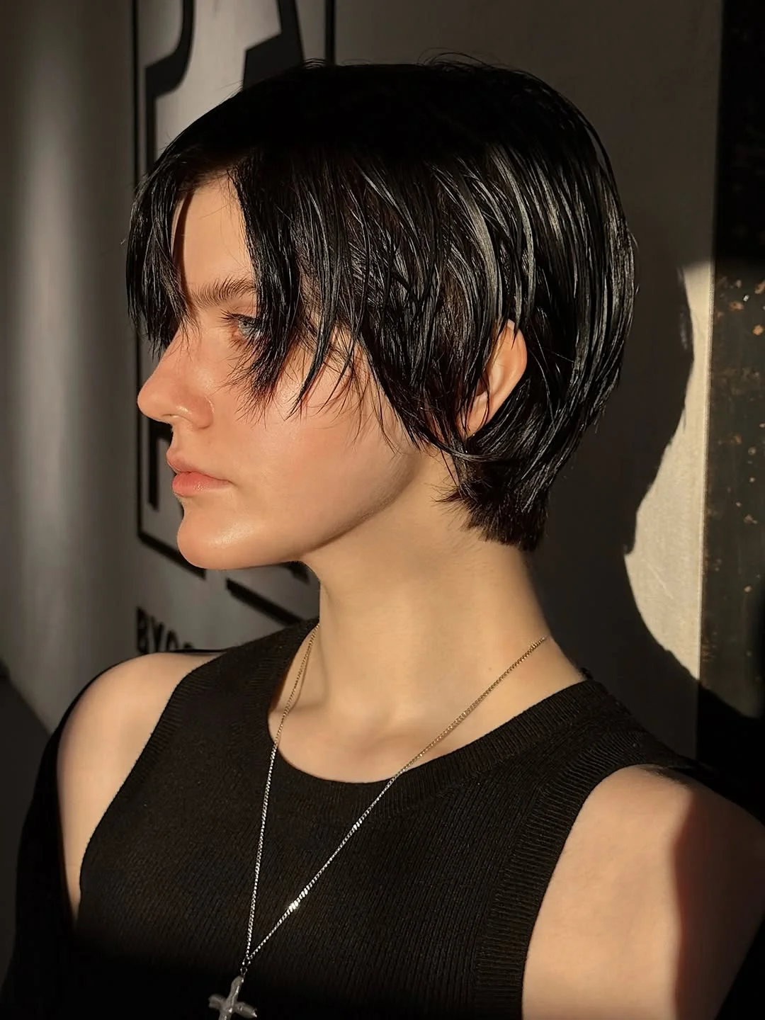 cute summer short haircuts 2026 Edgy Wet Look Pixie Bob with Long Bangs