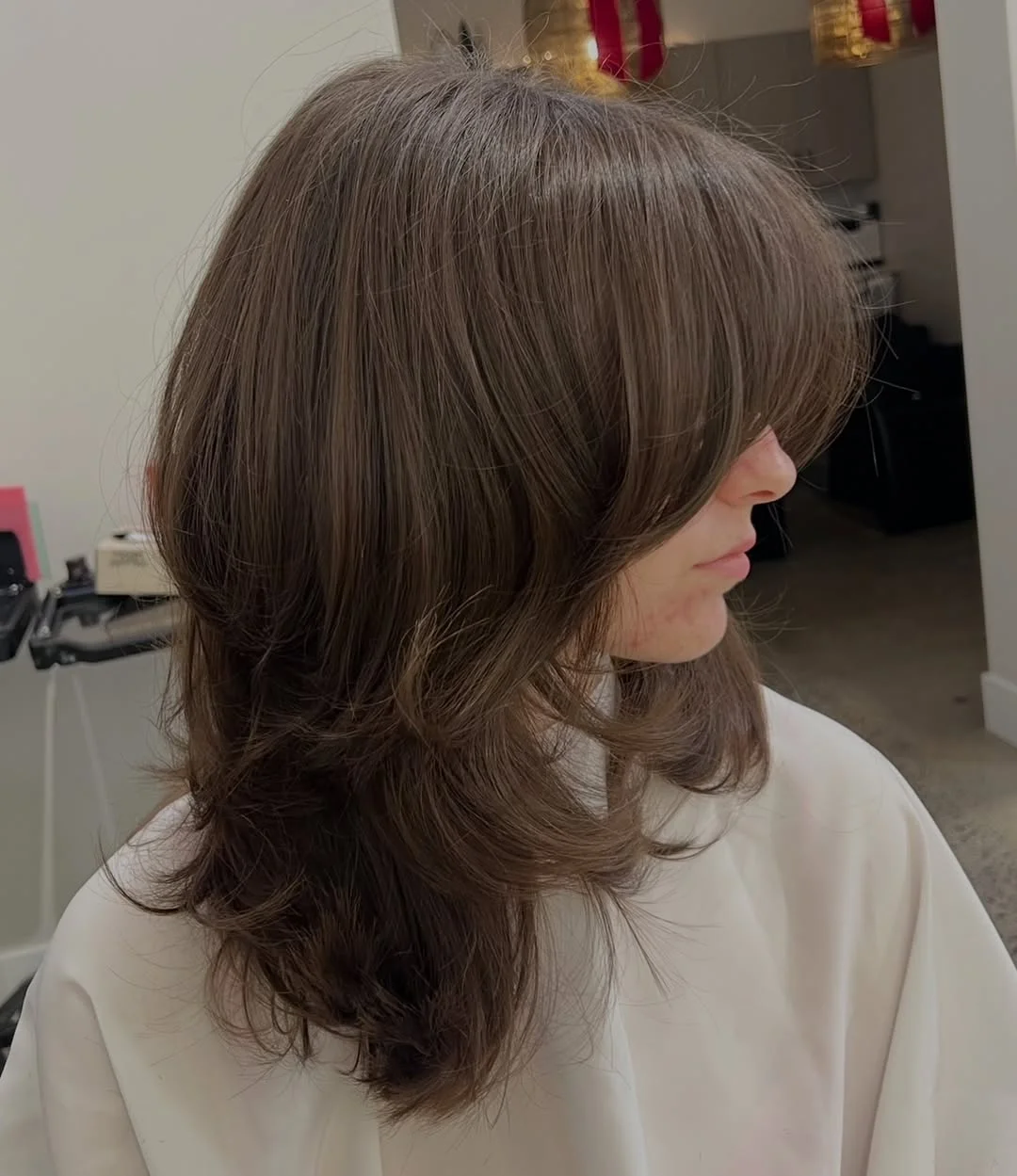 edgy summer wolf cut 2026 Feathered Medium Layers with Soft Volume