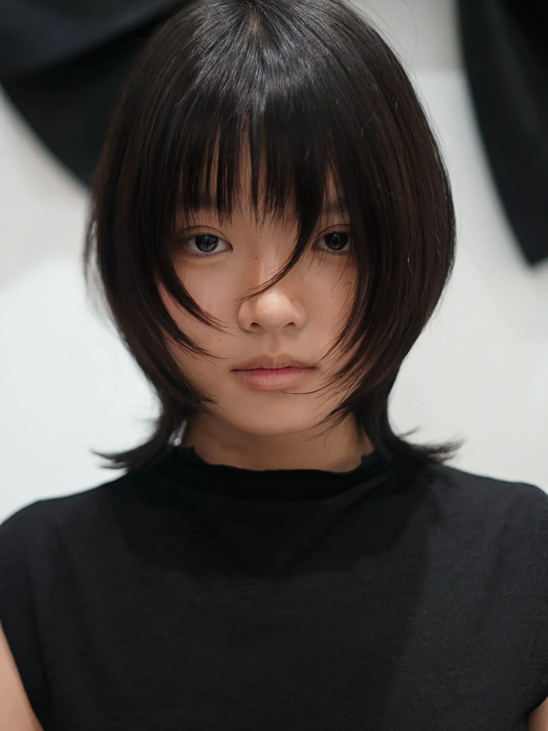 edgy summer wolf cut 2026 Soft rounded wolf with airy face framing