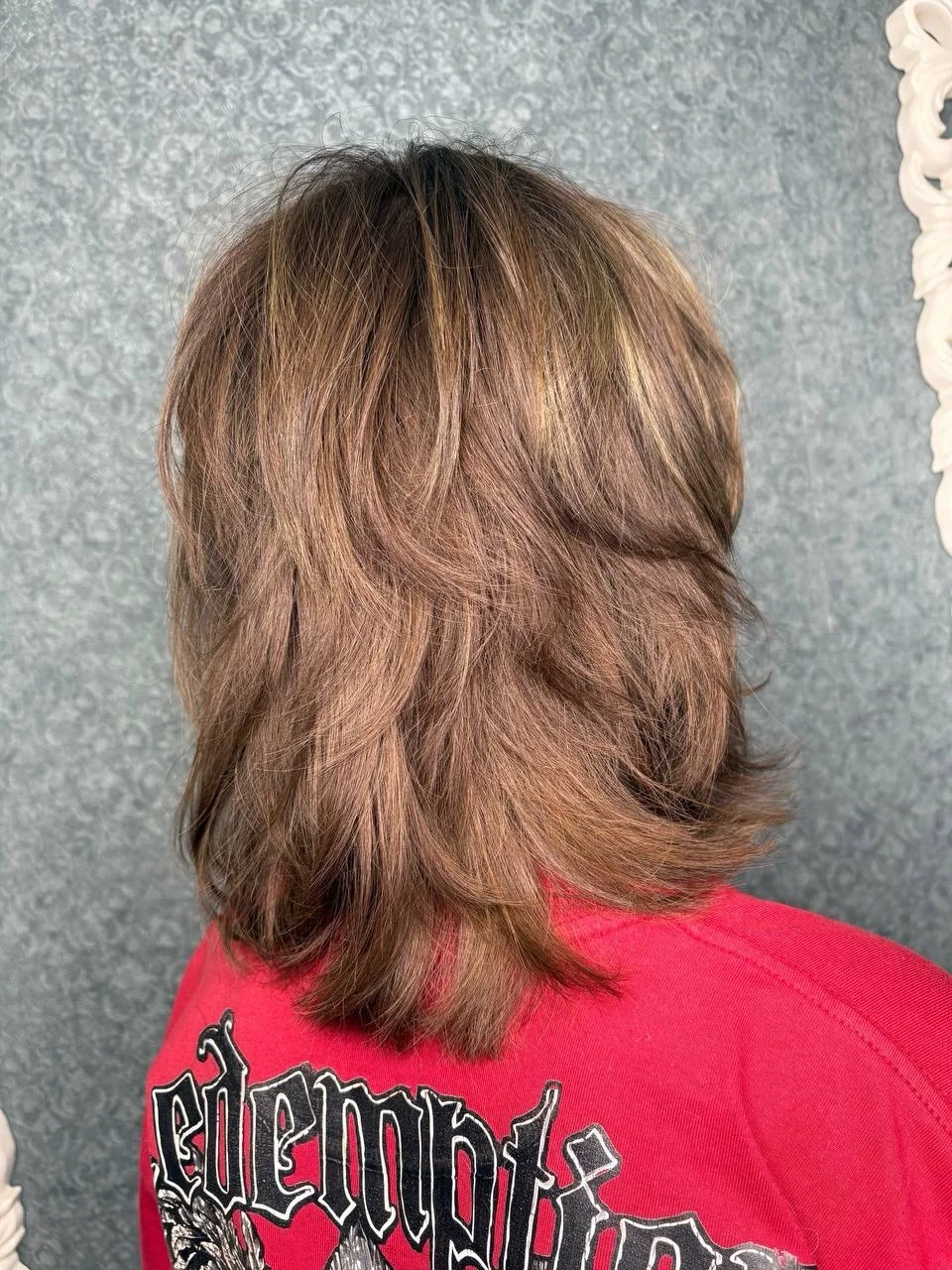 edgy summer wolf cut 2026 Layered mid length wolf with natural flow
