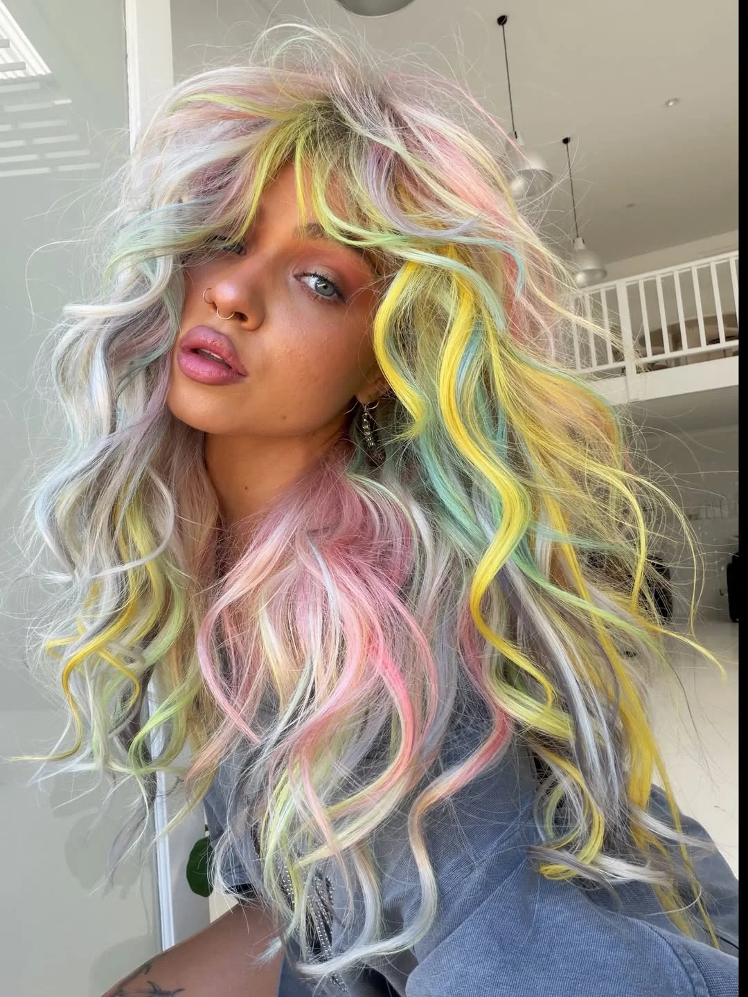 face-framing summer butterfly haircut 2026 Playful Pastel Volume with Soft Curly Chaos