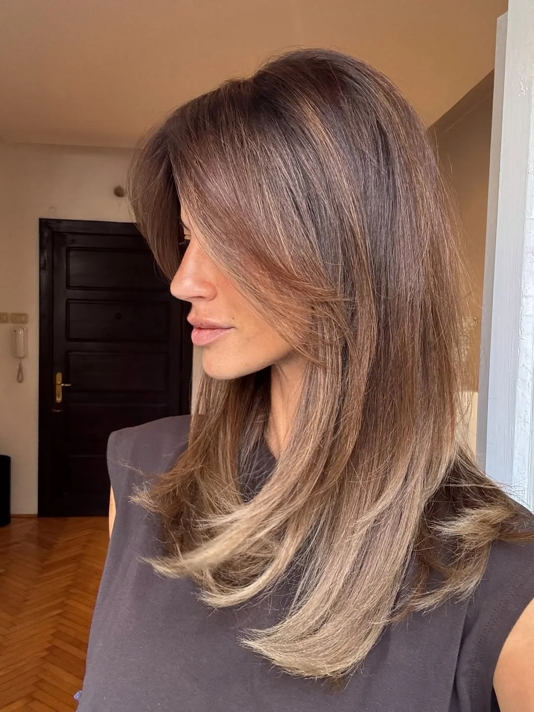 face-framing summer butterfly haircut 2026 Soft Brunette Flow with Feathered Movement