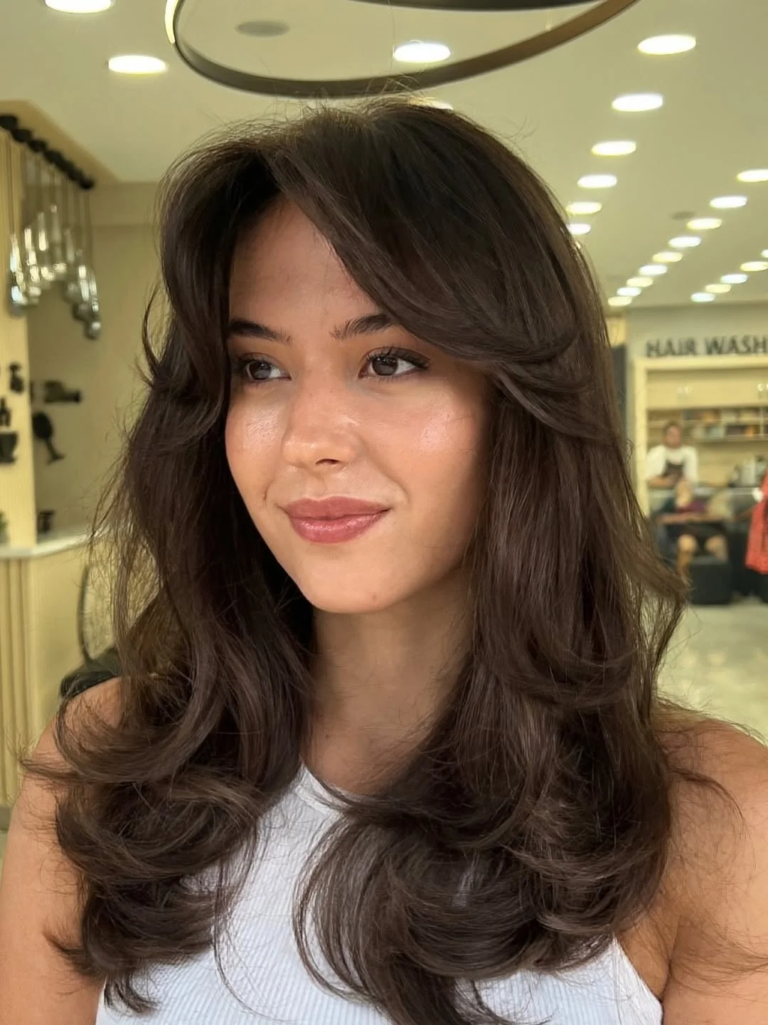 face-framing summer butterfly haircut 2026 Classic Volume with Curtain Bangs Energy
