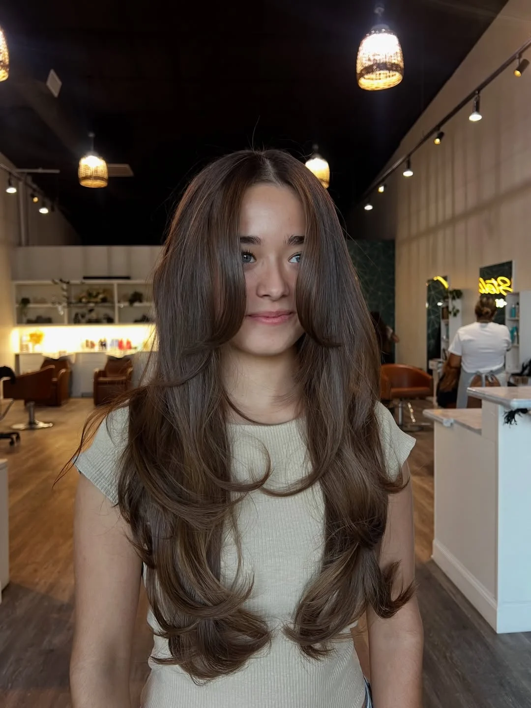 face-framing summer butterfly haircut 2026 Natural Espresso Layers with Effortless Finish