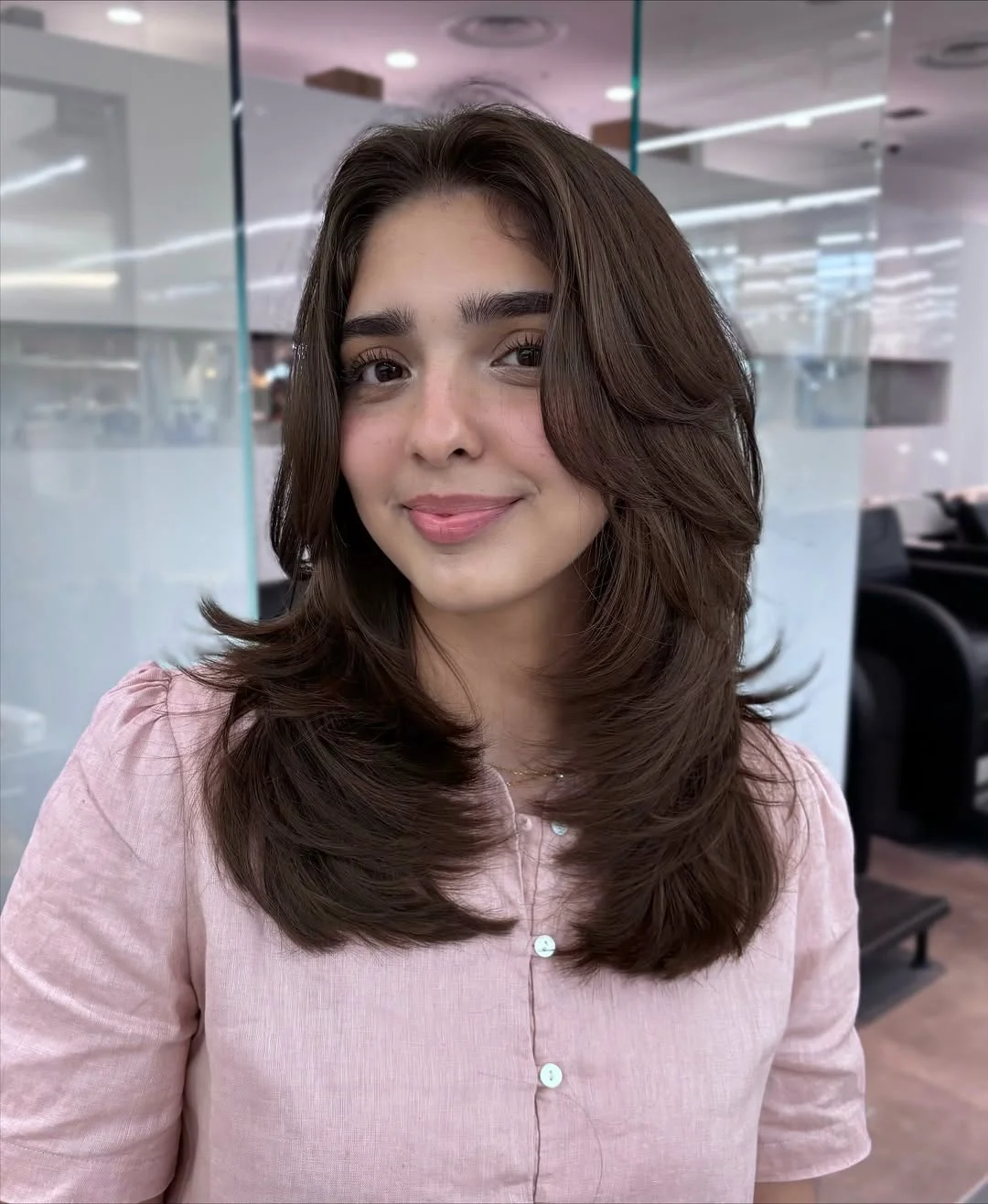 face-framing summer butterfly haircut 2026 Soft Chocolate Butterfly with Airy Movement