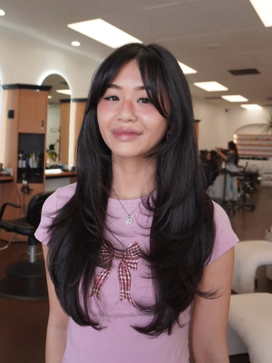 face-framing summer butterfly haircut 2026 Delicate Layered Length with Wispy Bangs