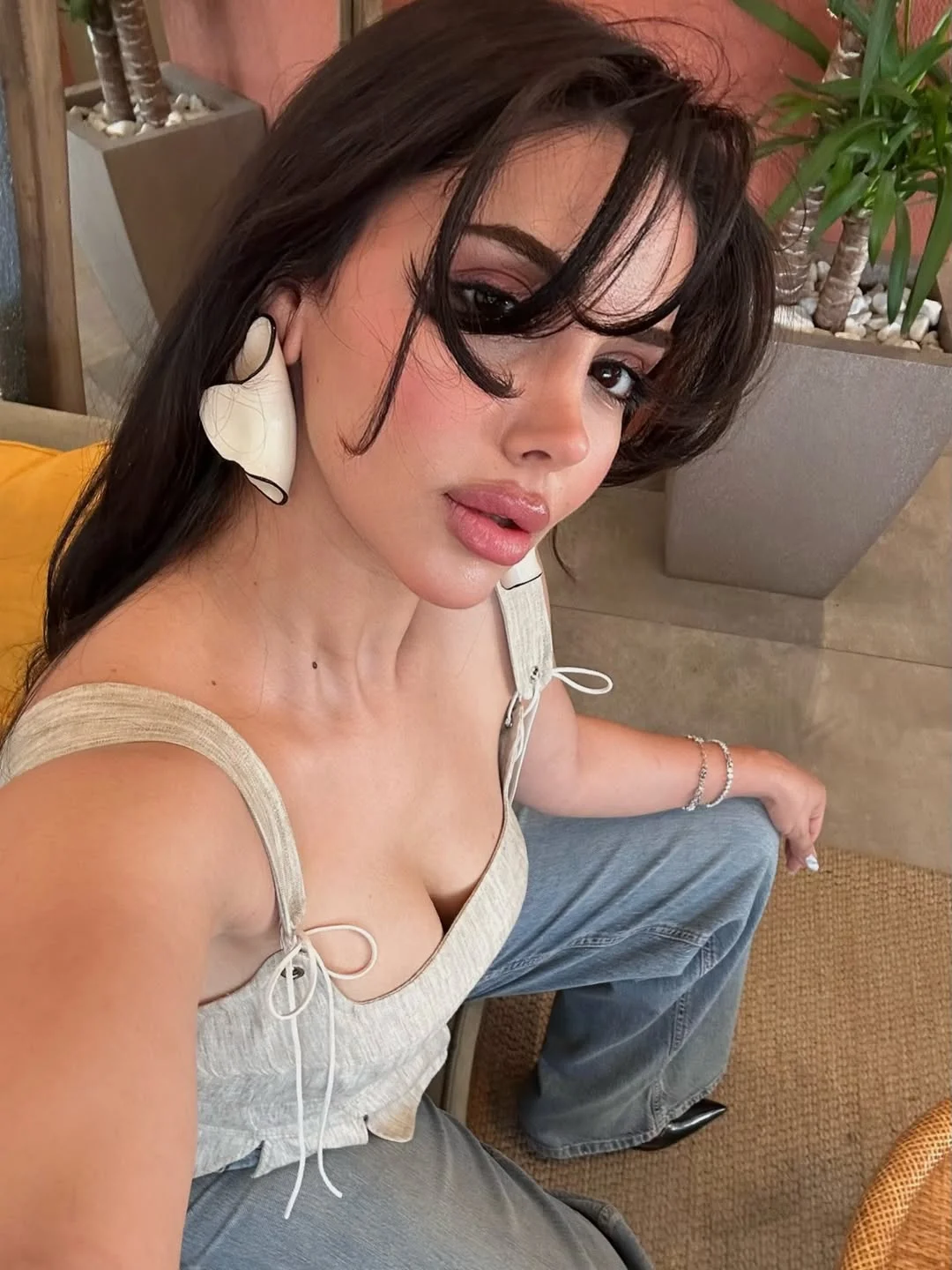 face-framing summer haircuts with bangs 2026 Soft Brunette Shag with Effortless Fringe Flick