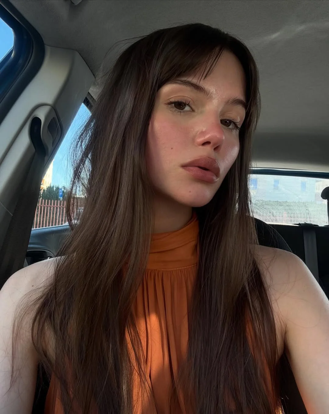 face-framing summer haircuts with bangs 2026 Minimalist Straight Length with Barely There Bangs