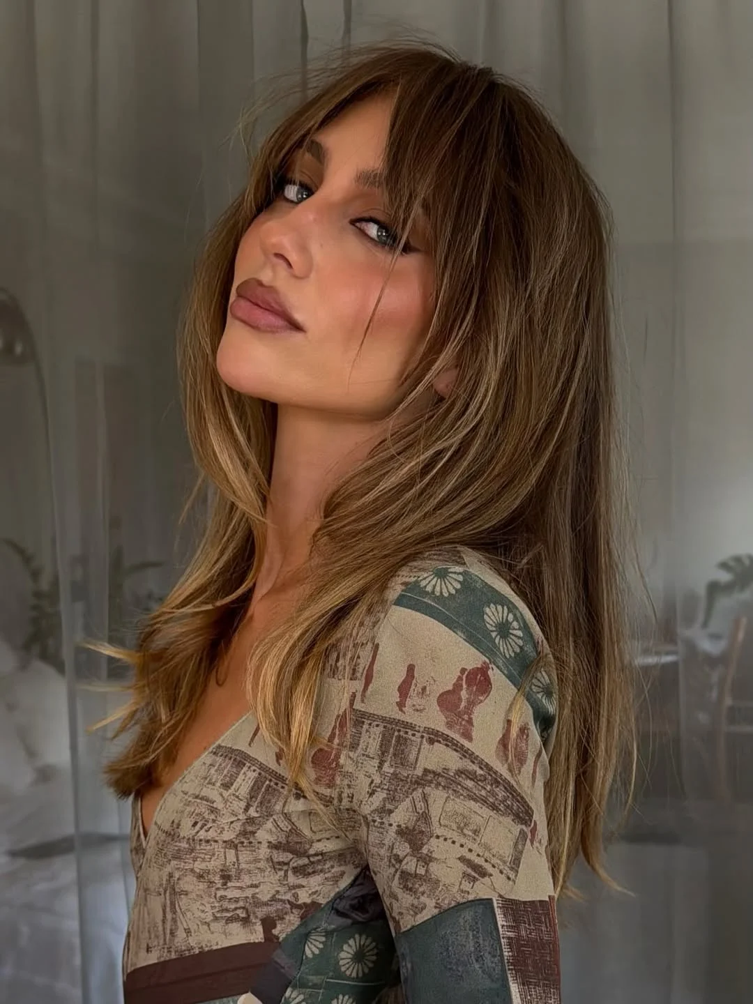 face-framing summer haircuts with bangs 2026 Effortless Mid-Length Shag with Soft Contour Layers