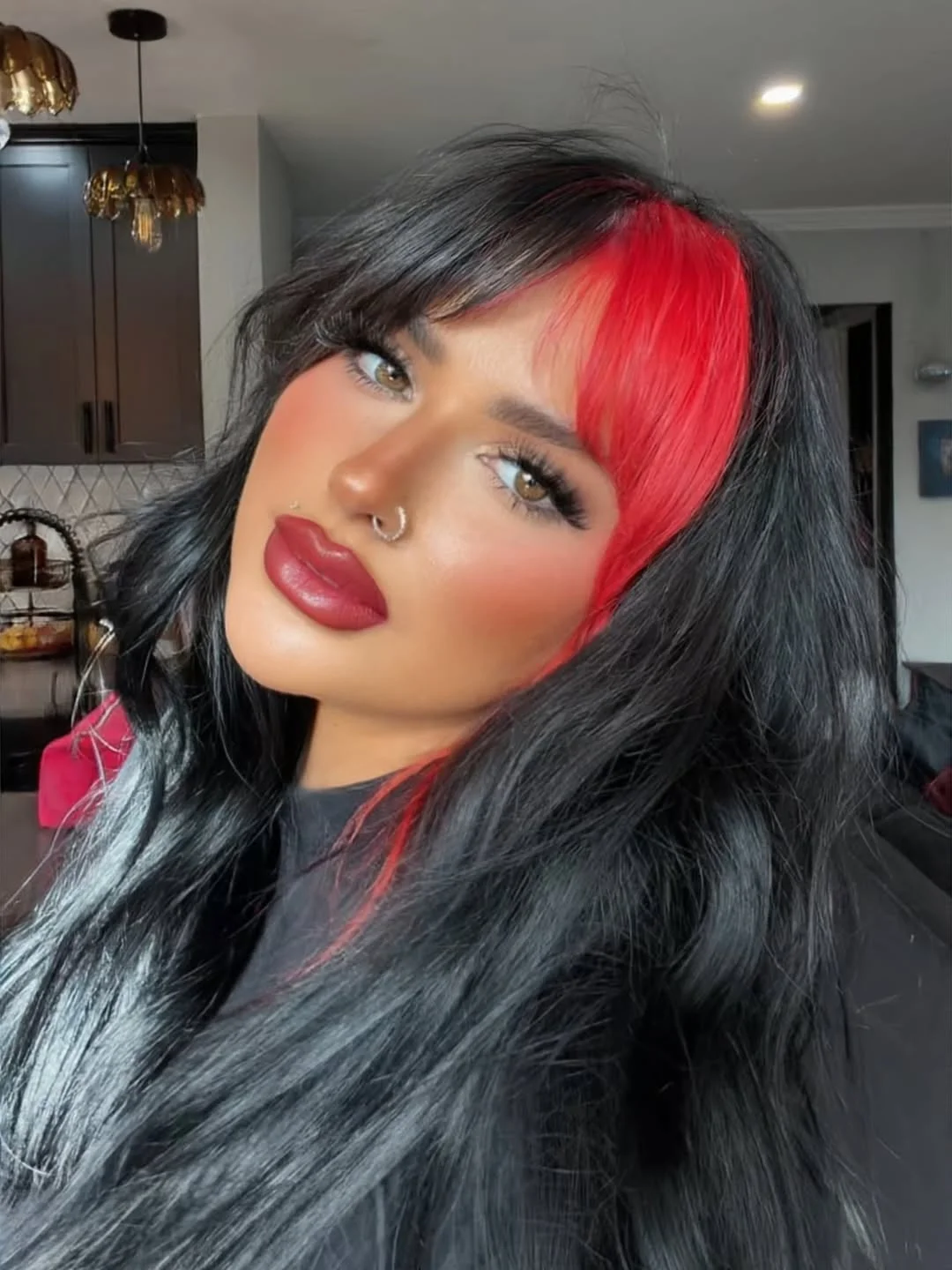 face-framing summer haircuts with bangs 2026 Bold Split Fringe with Dark Waves