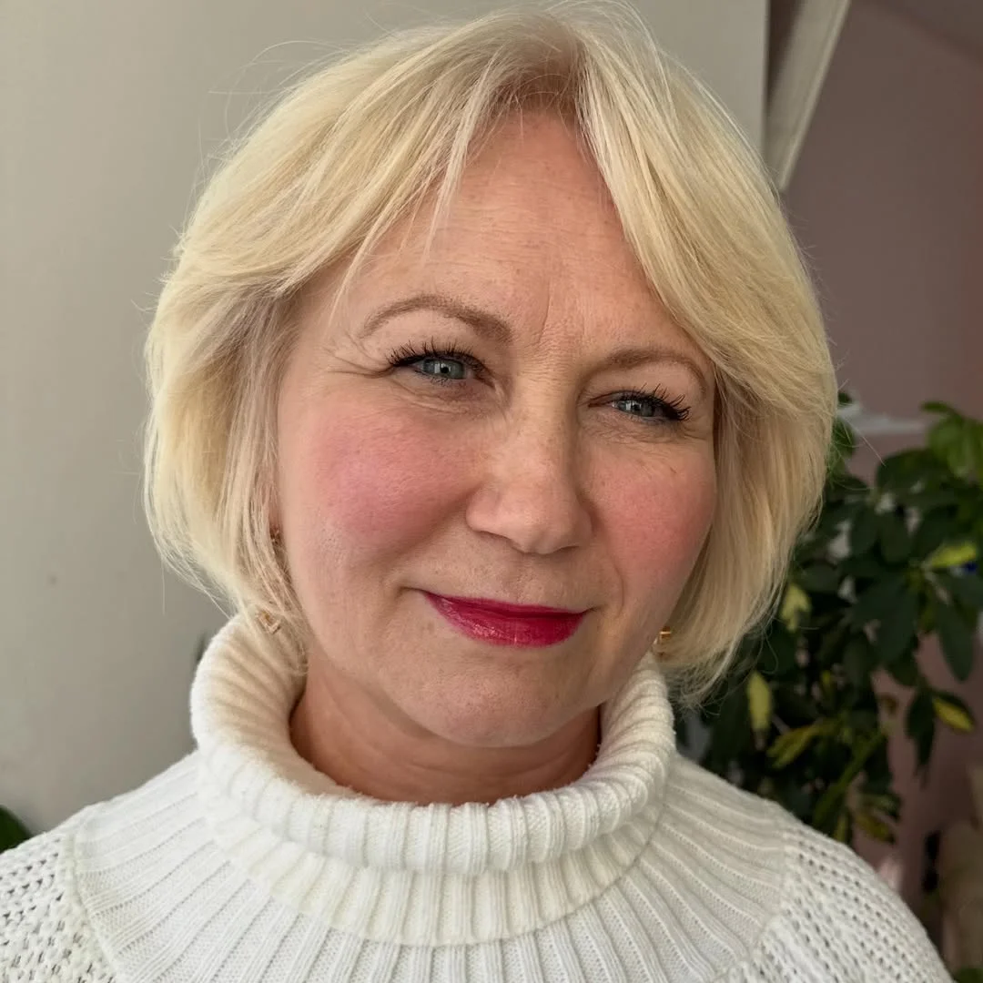 flattering summer haircuts for women over 50 2026 Airy Blonde Bob With Face-Framing Lightness
