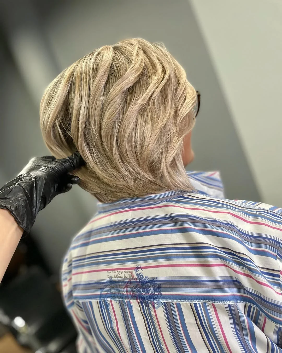 flattering summer haircuts for women over 50 2026 Airy Blonde Layered Bob with Lift