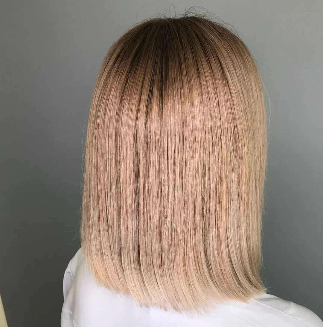 flattering summer haircuts for women over 50 2026 Blunt Long Bob with Clean Lines