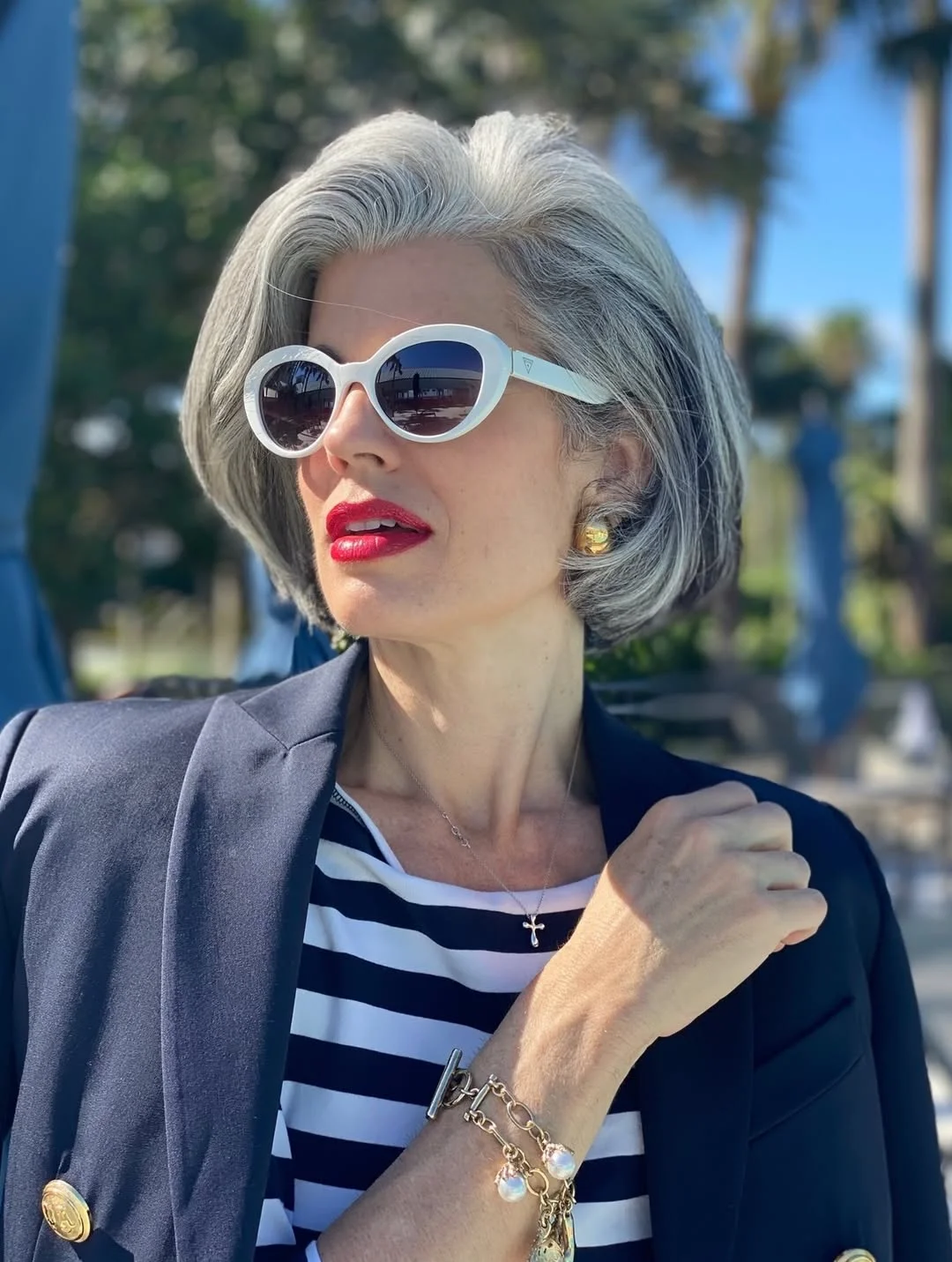 flattering summer haircuts for women over 60 2026 Classic Short Wavy Bob with Polished Volume
