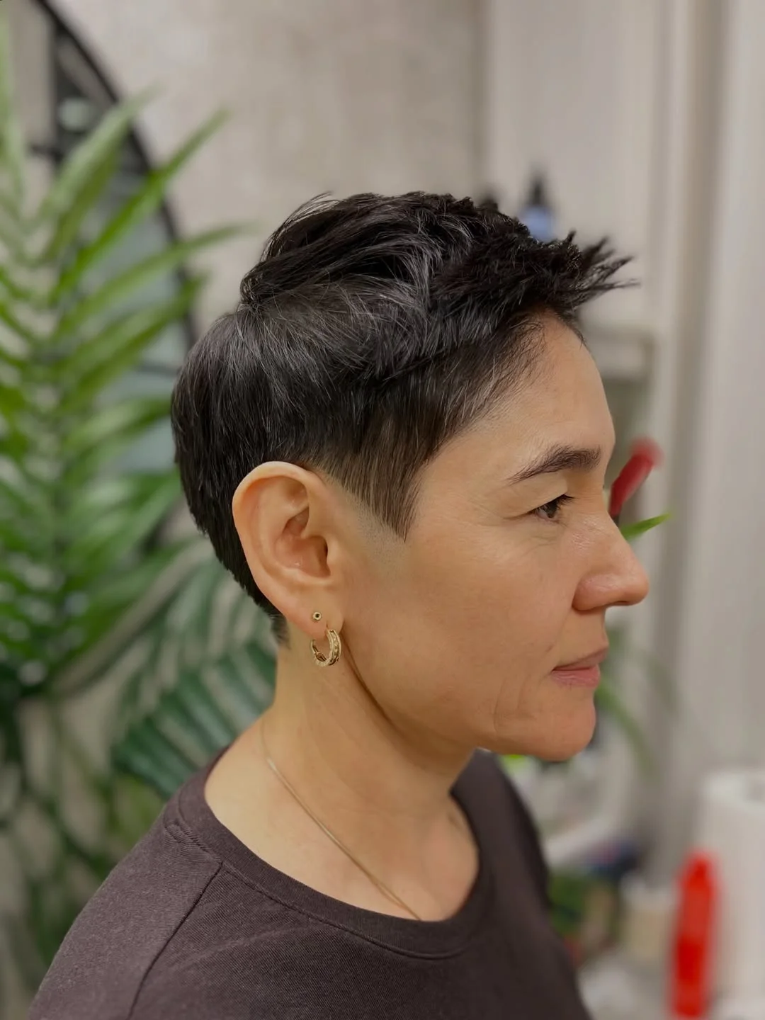flattering summer haircuts for women over 60 2026 Textured Brunette Crop with Natural Movement