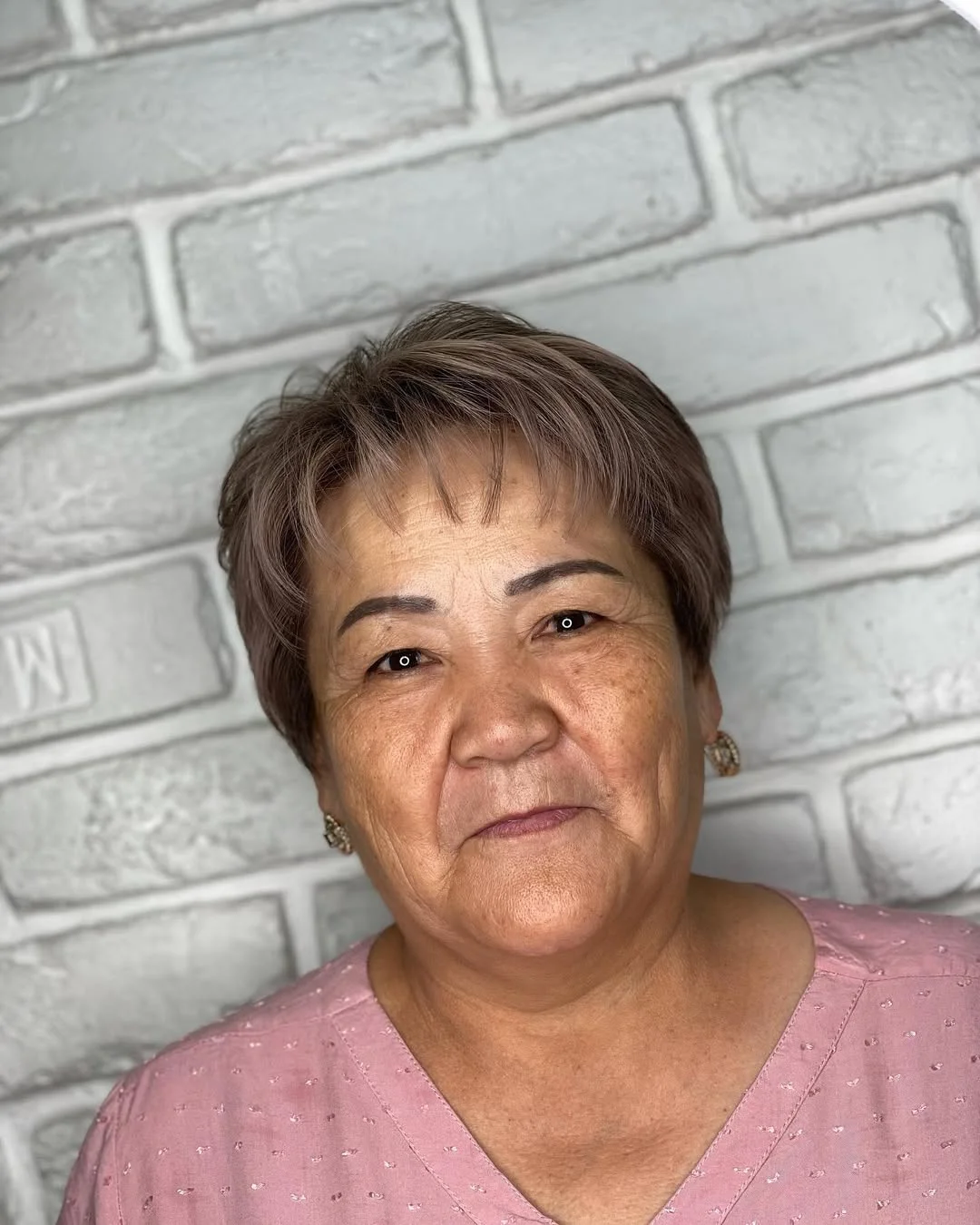 flattering summer haircuts for women over 60 2026 Soft Rounded Bob with Natural Warmth
