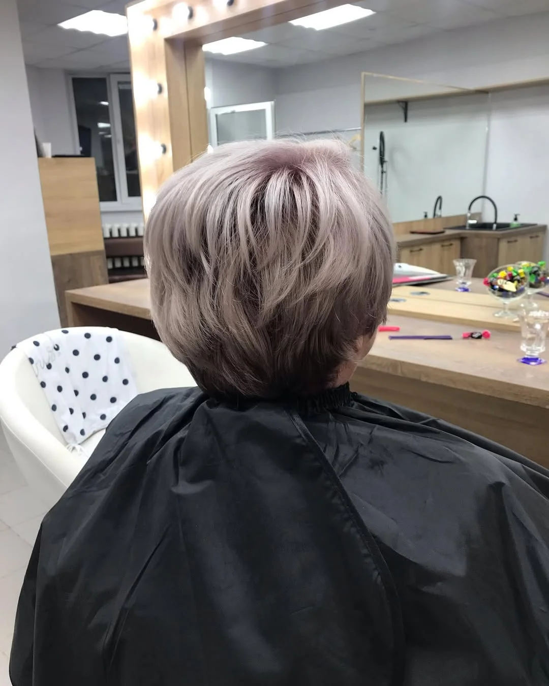 flattering summer haircuts for women over 60 2026 Feathered Volume with a Salon-Fresh Finish