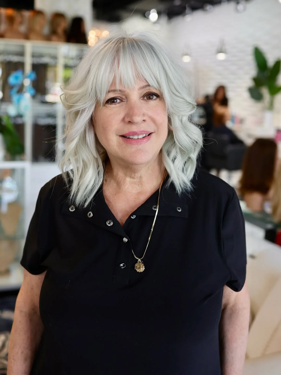 flattering summer haircuts for women over 60 2026 Soft Medium Shag with Feathered Bangs