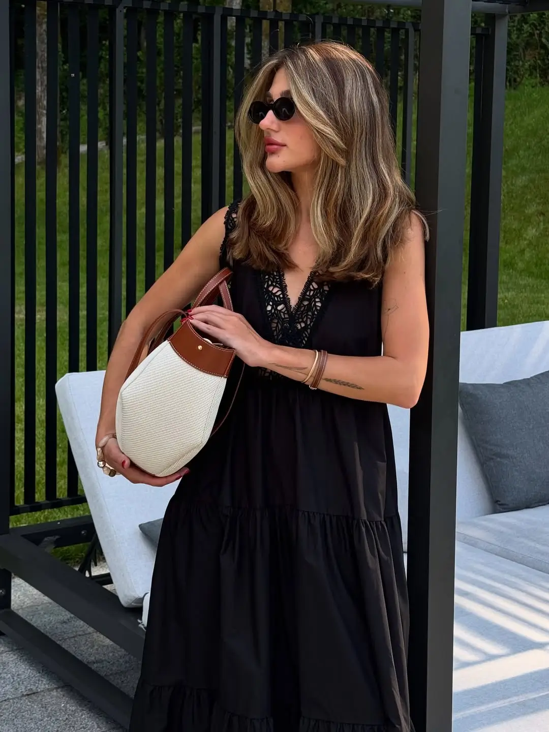 hot summer heat wave outfits 2026 Black Flowy Dress with Subtle Drama