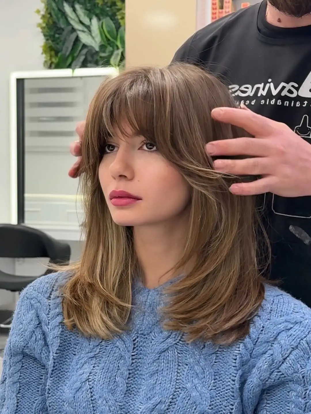 layered summer haircut for round face 2026 Mid-Length Layers with Wispy Bangs Energy