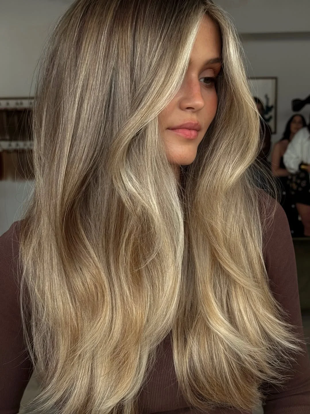 layered summer haircuts for fuller faces 2026 Butterfly Layers for Airy Volume Without Width