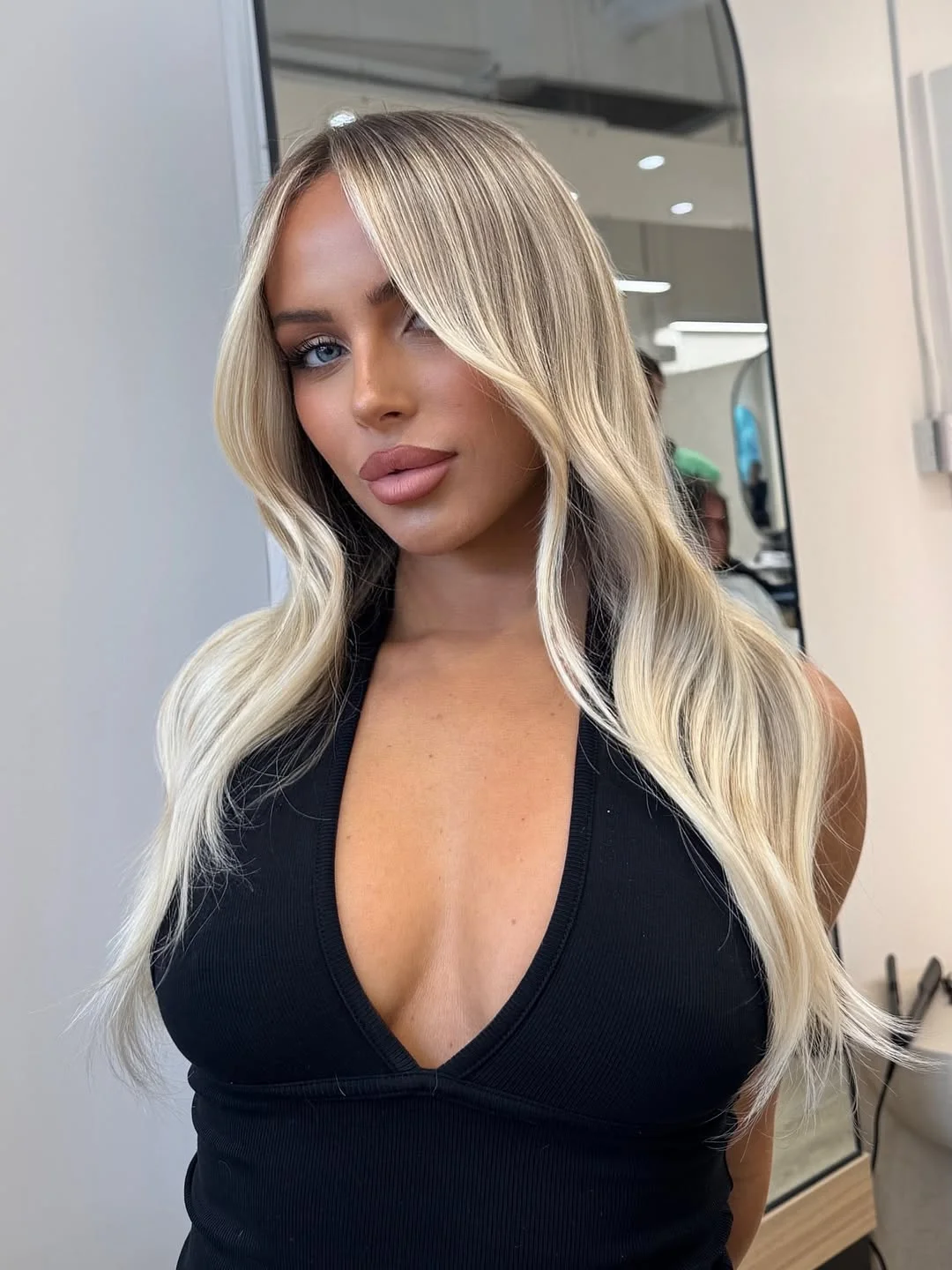 layered summer haircuts for fuller faces 2026 Mid-Length Curtain Layers That Frame Without Closing In