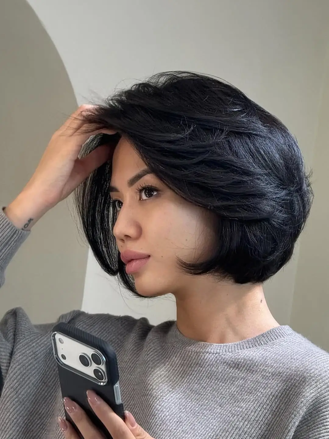 layered summer haircuts for thin fine hair 2026 Voluminous Side Swept Bob with Lifted Layers