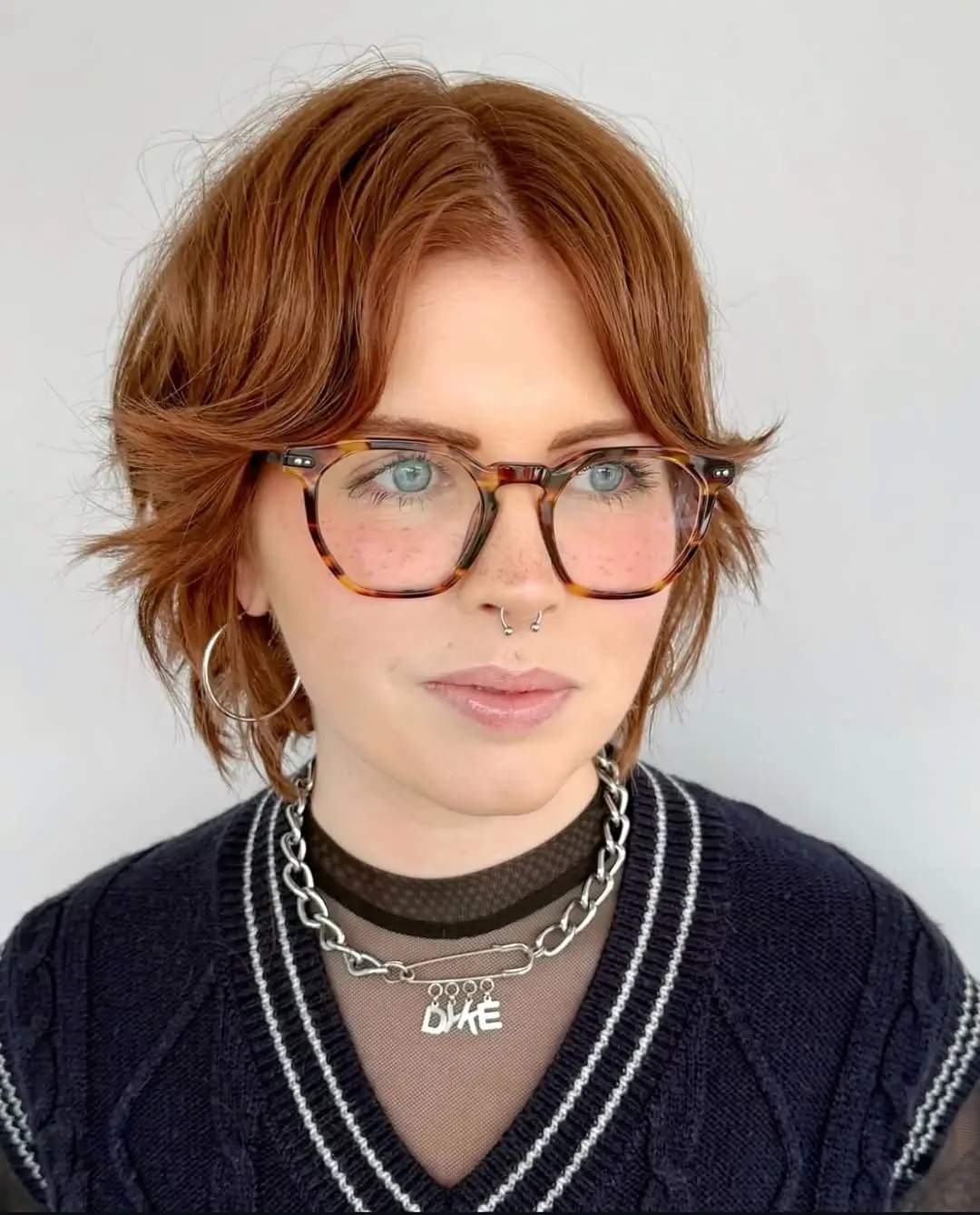 layered summer shag haircut 2026 Soft Ginger Micro Shag with Airy Texture