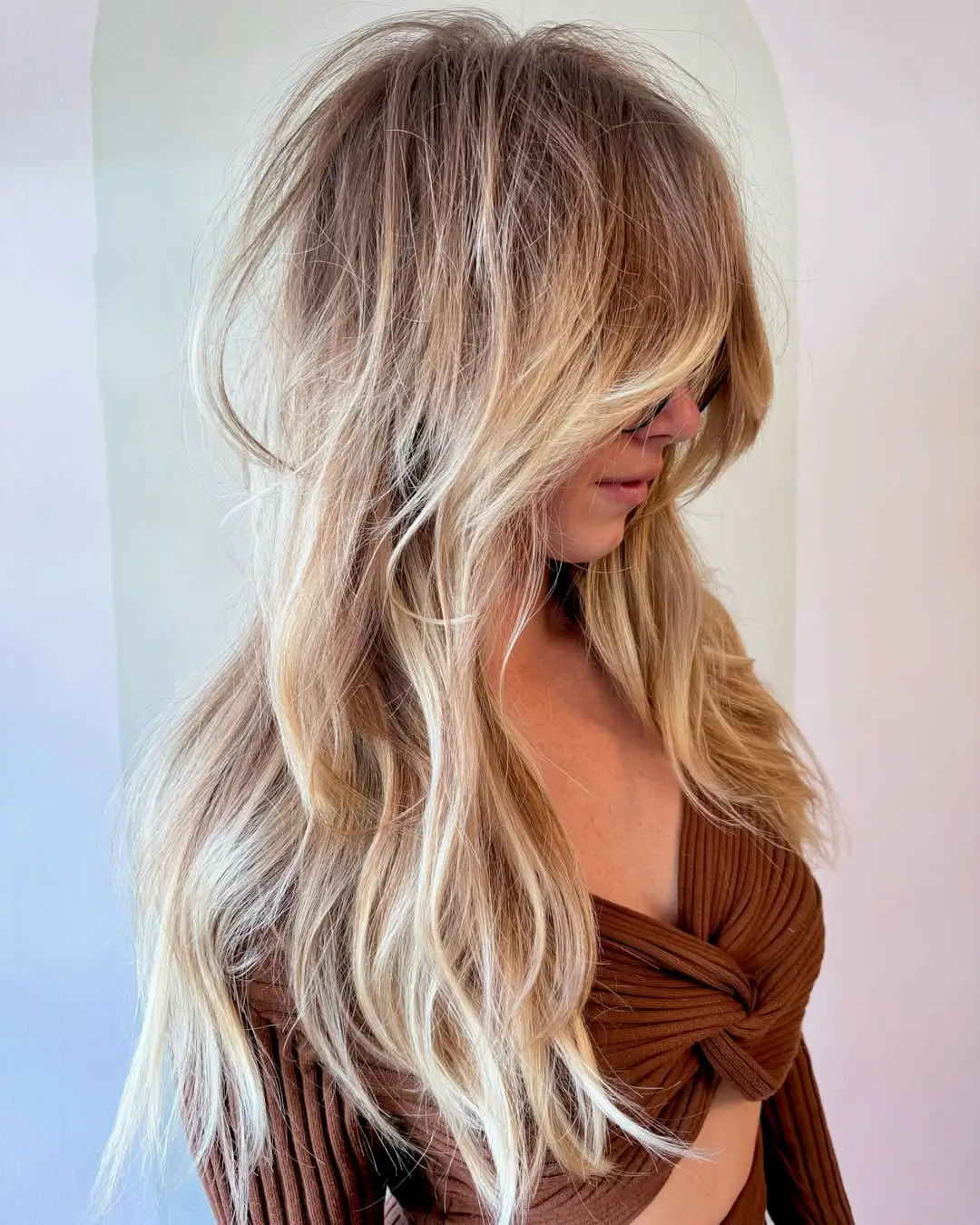 layered summer shag haircut 2026 Long Blonde Layered Shag with Feathered Volume