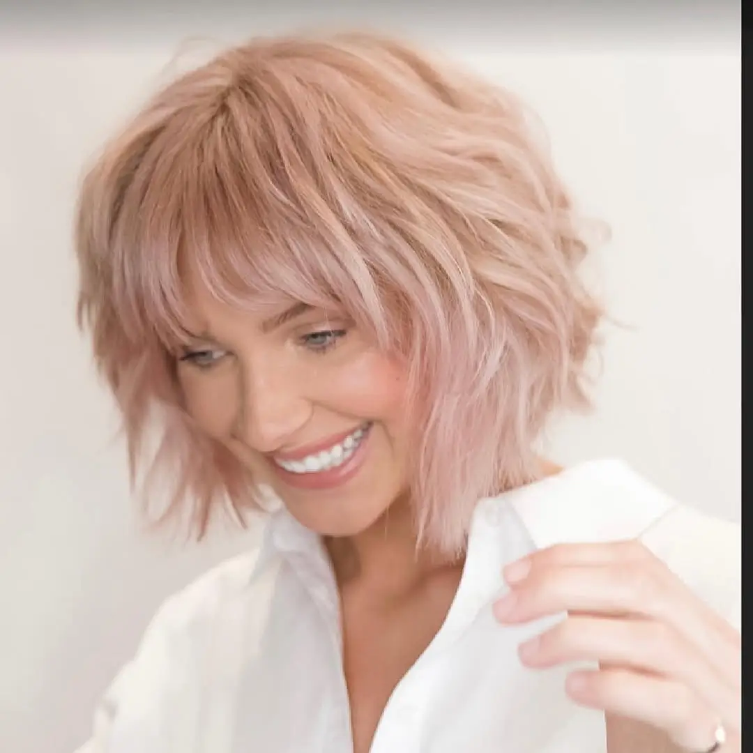 layered summer shag haircut 2026 Short shag with playful pastel edge