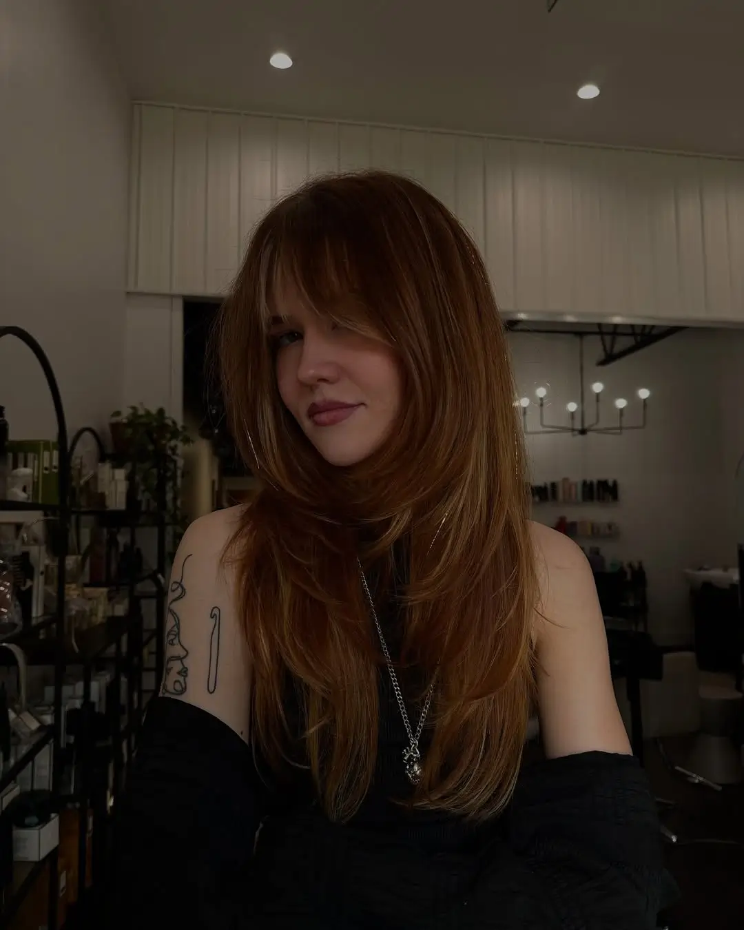 layered summer shag haircut 2026 Warm copper shag with flowing layers