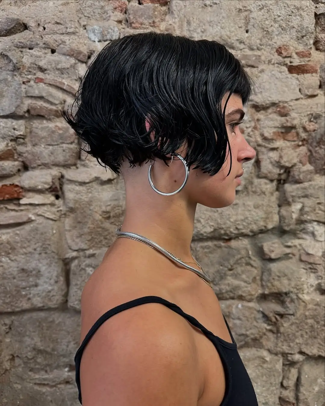 sleek summer bob haircut 2026 Wet look micro bob with edgy finish