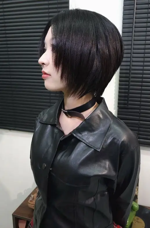 sleek summer bob haircut 2026 Asymmetrical short bob with sharp edge