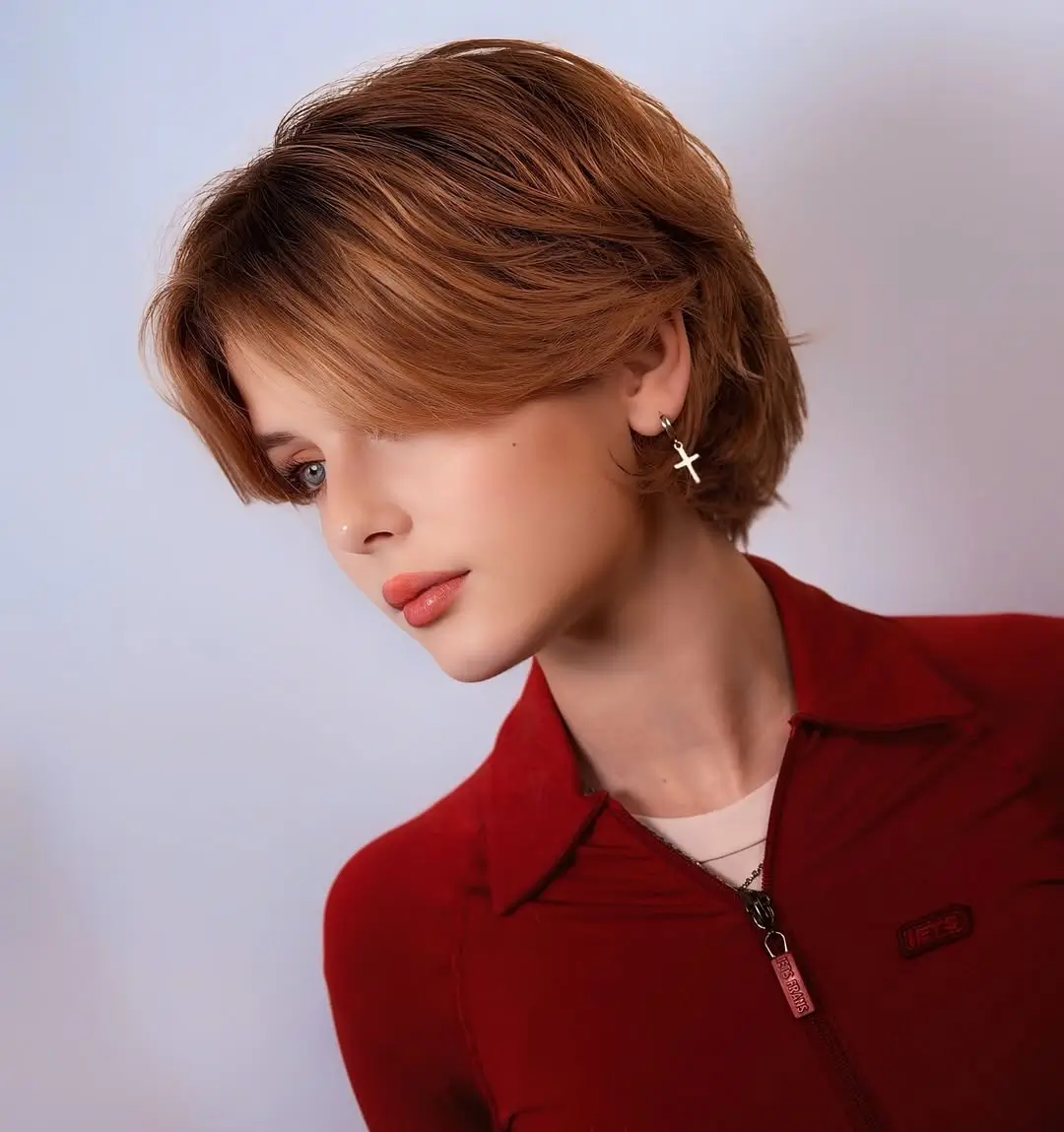 sleek summer bob haircut 2026 Feathered Short Bob with Soft Side Bangs