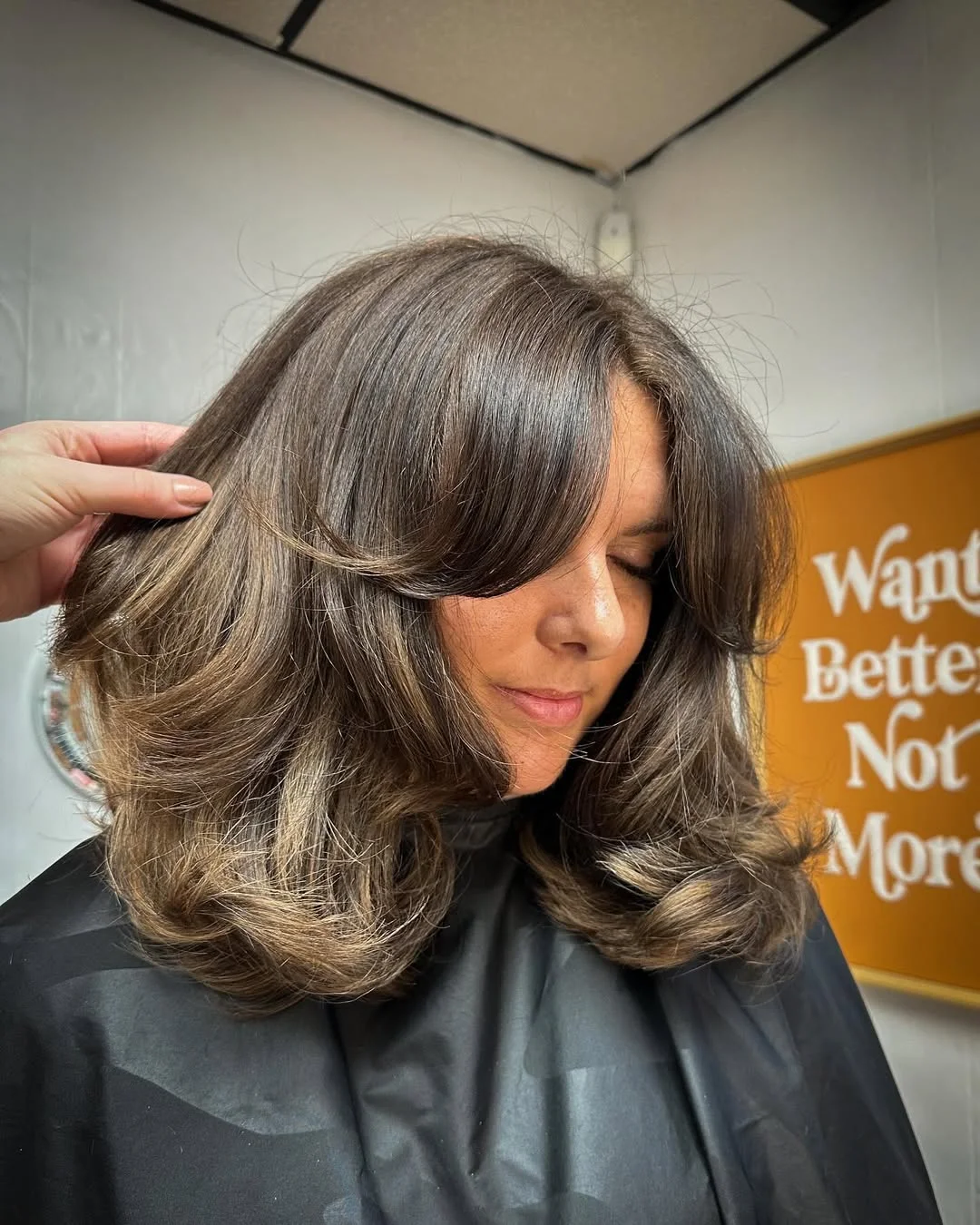 slimming summer haircuts for plus size women 2026 Layered Medium Length Blowout with Curtain Flow
