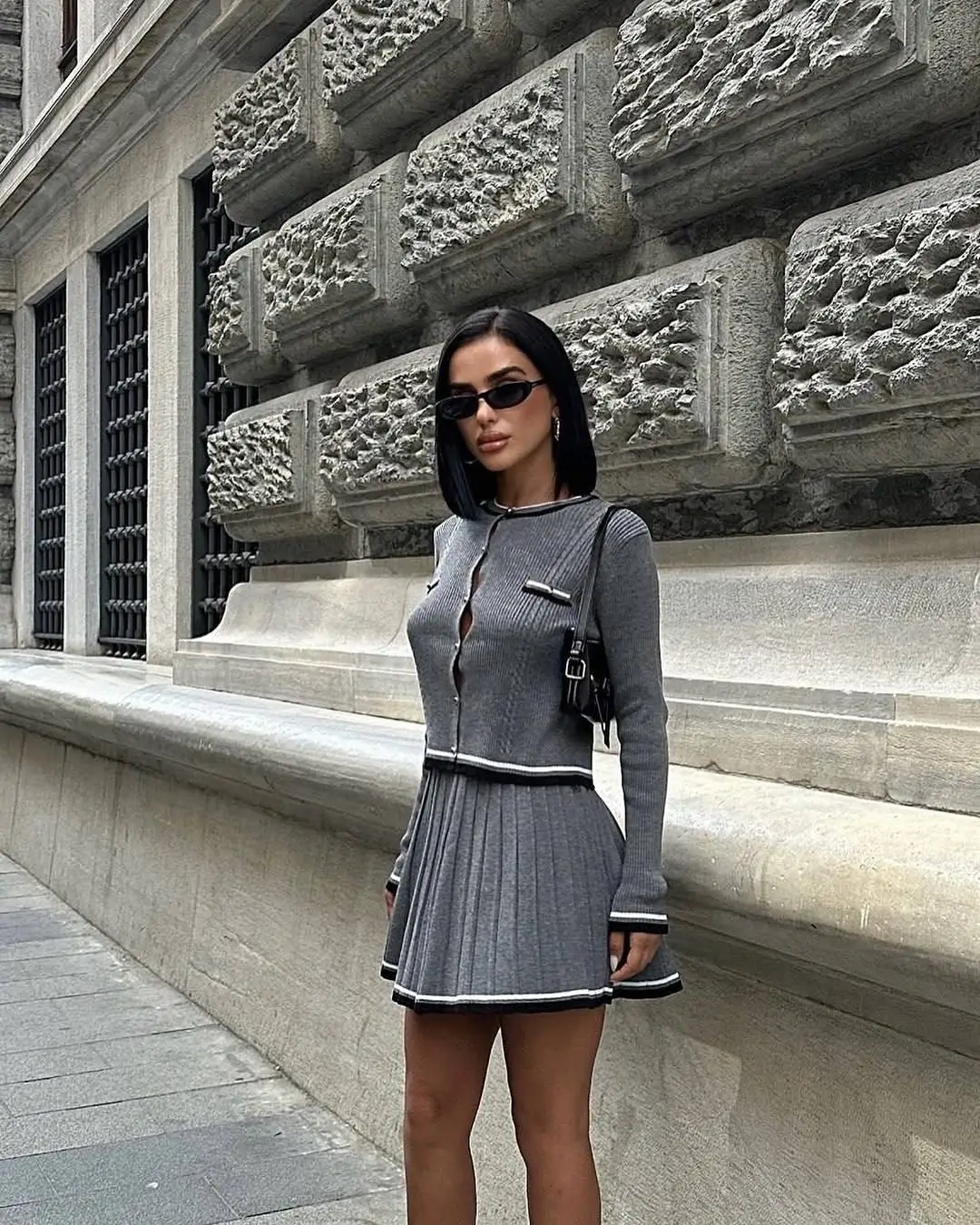 summer business casual outfit for women 2026 Fitted Knit and Pleated Mini Confidence