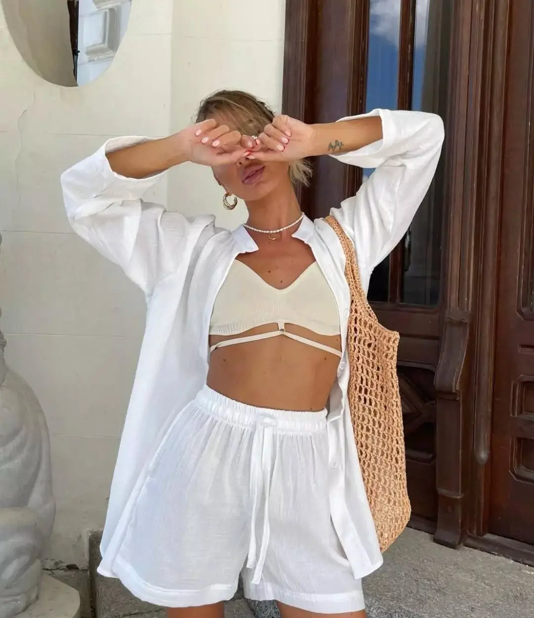 summer sleeveless tops for women 2026 Airy White Layers With a Coastal Feel