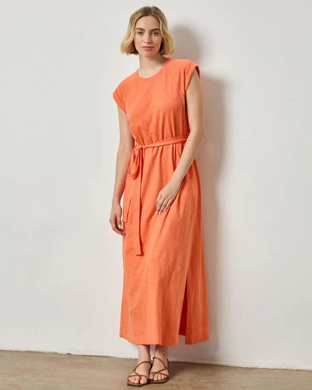 summer sundresses for women 2026 The Effortless Orange Midi That Carries You Through the Heat