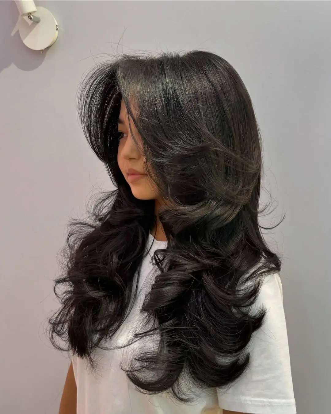 textured summer haircuts for long hair 2026 Feathered Volume Layers with a Soft Side Sweep