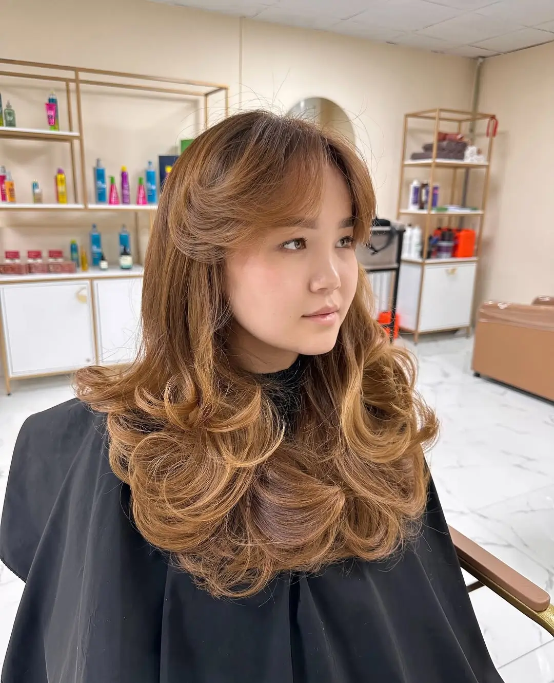 textured summer haircuts for long hair 2026 Soft Rounded Layers with Curtain Bang Lift